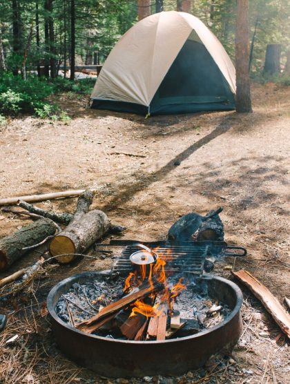 bonfire-camp-forest-set-by-hikers_181624-7040